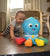 baby playing with opus