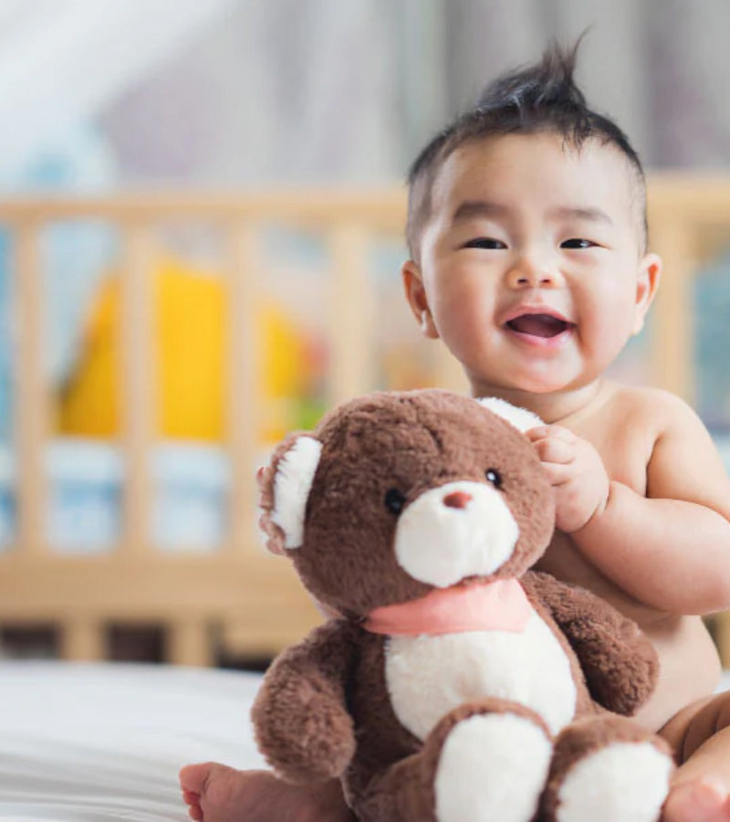 baby-with-teddy-bear