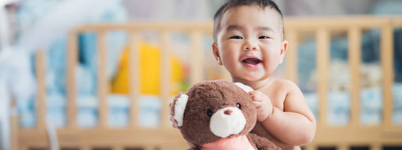 baby with teddy bear