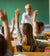 elementary students raising their arms on a class