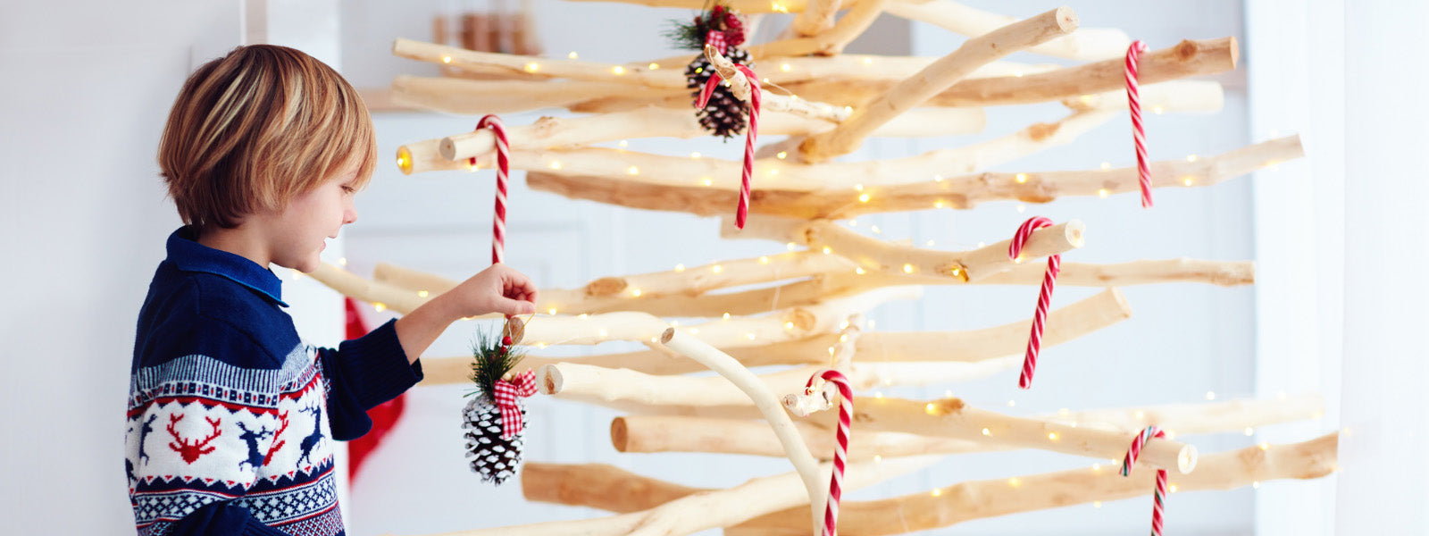 kid decorate handcrafted christmas tree