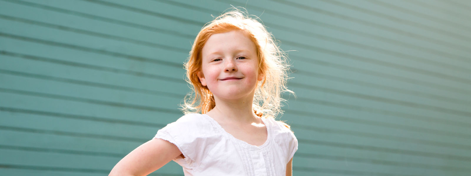 smiling redheaded girl