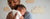 young father holding baby